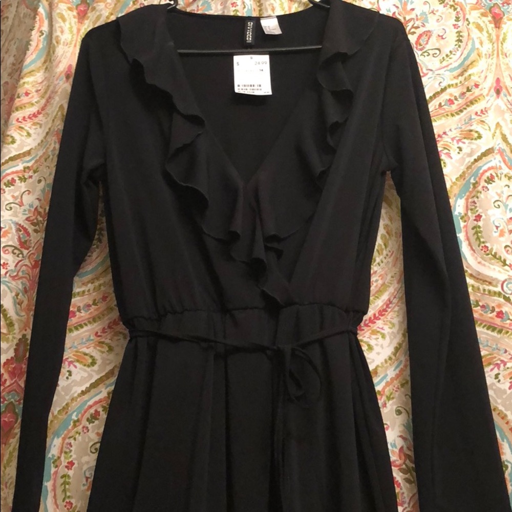 Black long sleeved short dress with ruffles v neck